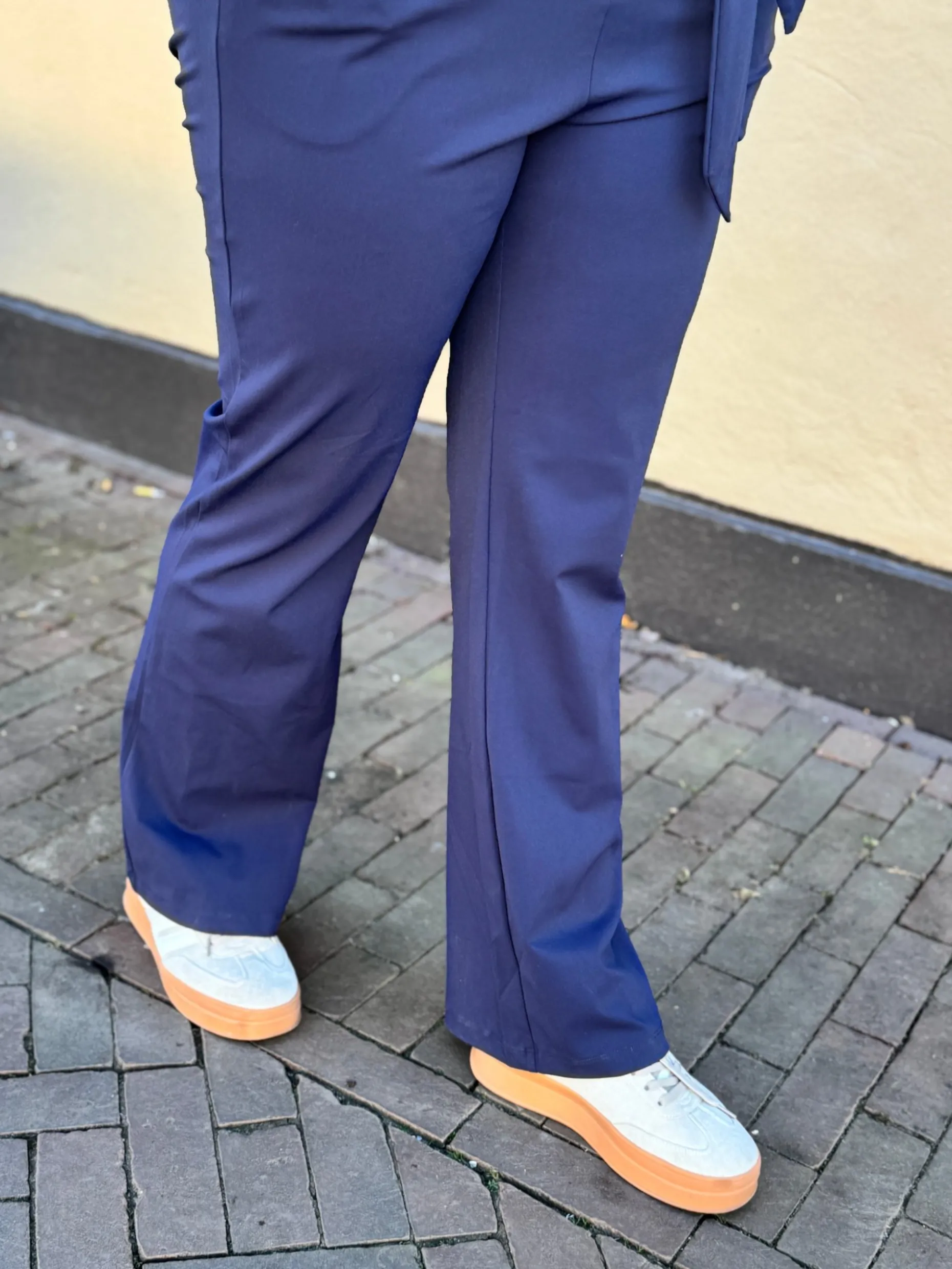 Travelstof jumpsuit mouwloos navy